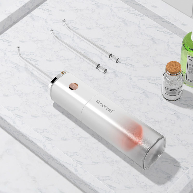 Flosser Air Tanpa Kabel Sonic Portabel Pembersihan Dalam Isi Ulang Dengan Empat Nozel